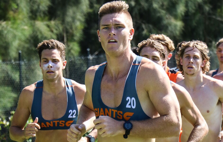 Adam Tomlinson was leading the GIANTS' 2km time trial on Wednesday before a calf complaint forced him to withdraw with less than half a lap remaining. Adam Tomlinson was leading the GIANTS' 2km time trial on Wednesday before a calf complaint forced him to withdraw with less than half a lap remaining. - AFL,GWS Giants,Adam Tomlinson